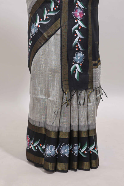 Grey zari design tussar saree with contrast floral print border and blouse