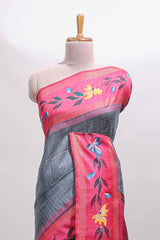 Dark grey zari design tussar saree with contrast floral print border and blouse