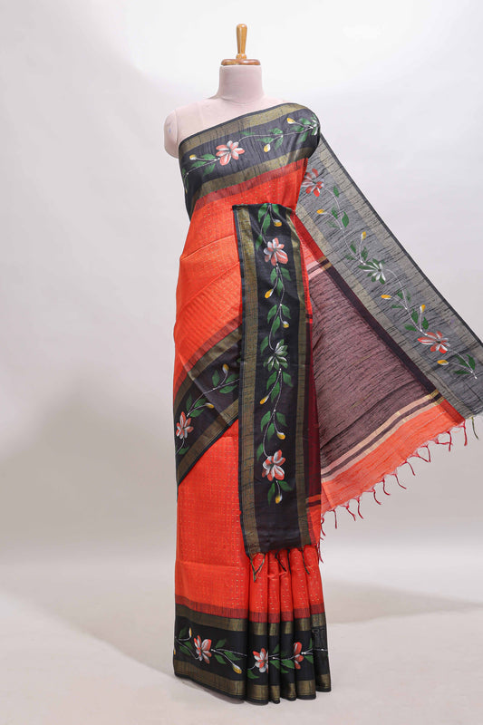 Orange zari design tussar saree with contrast floral print border and blouse