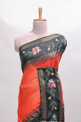 Orange zari design tussar saree with contrast floral print border and blouse