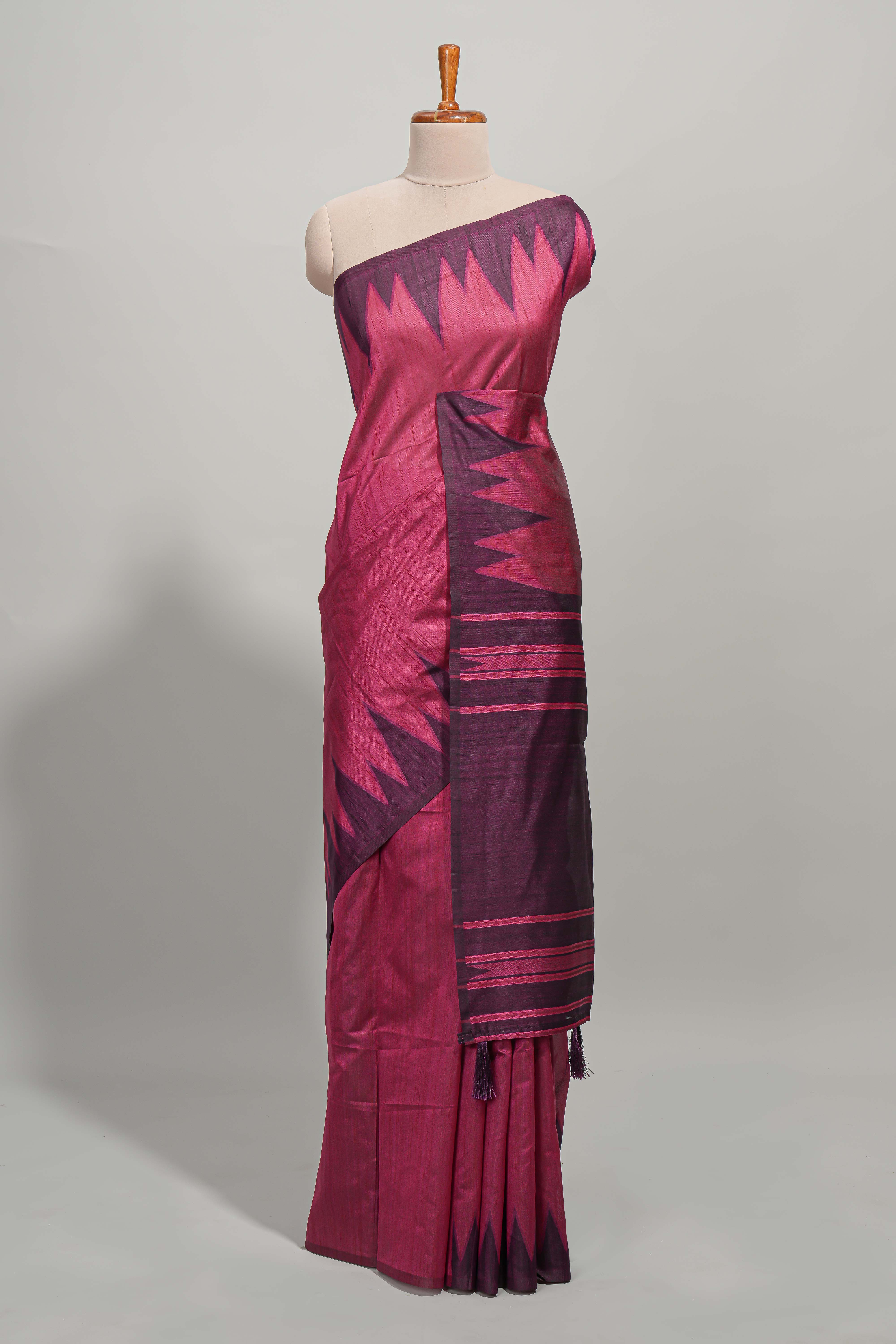 Magenta plain semi tussar saree with contrast geometric border and motifs blouse
