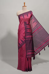Magenta plain semi tussar saree with contrast geometric border and motifs blouse
