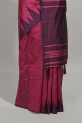 Magenta plain semi tussar saree with contrast geometric border and motifs blouse