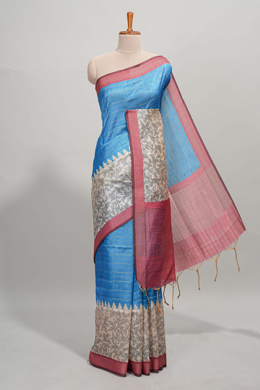 Blue striped floral design semi tussar saree with contrast border and striped blouse