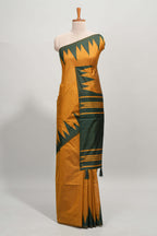 Mustard plain semi tussar saree with contrast geometric border and motifs blouse