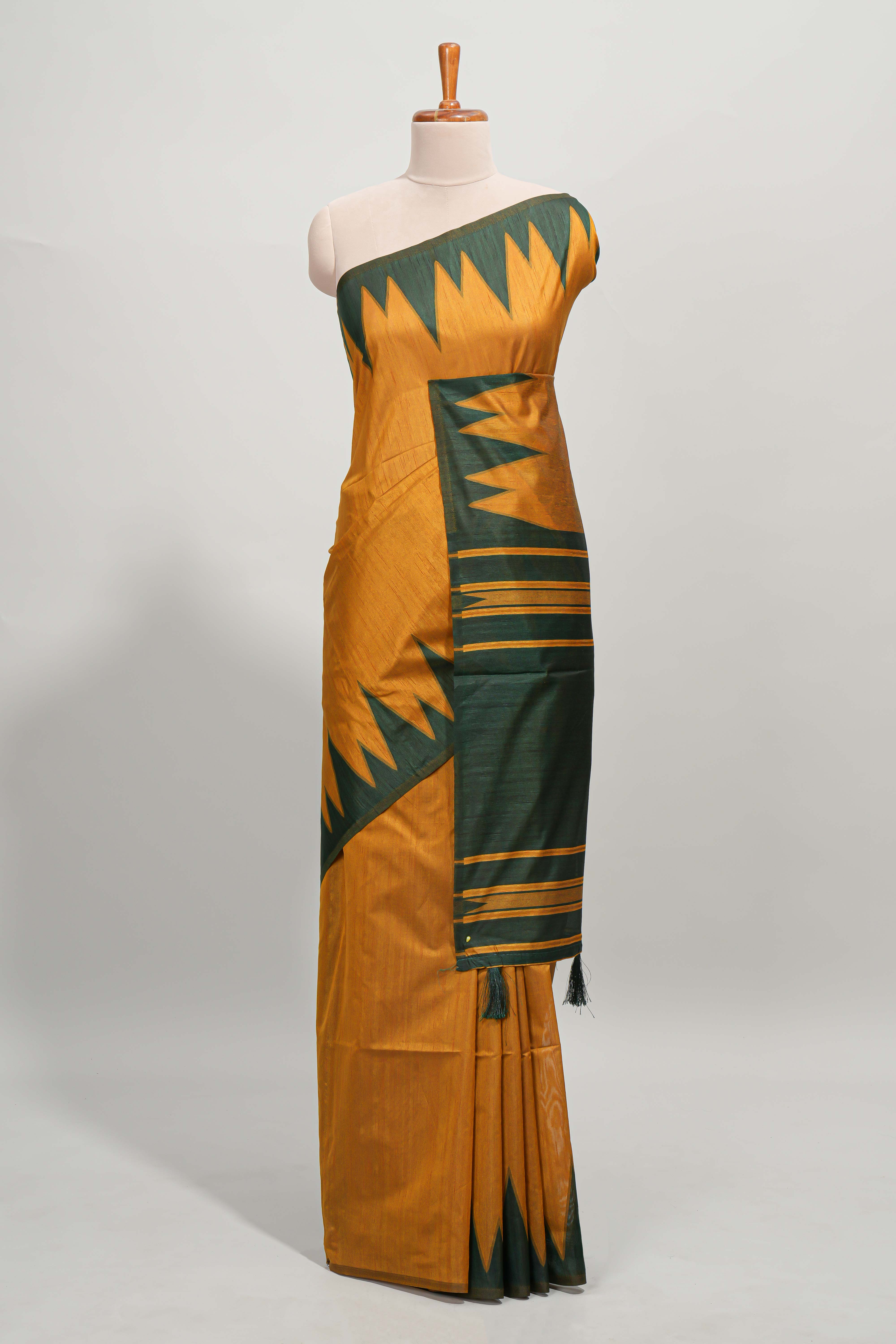 Mustard plain semi tussar saree with contrast geometric border and motifs blouse