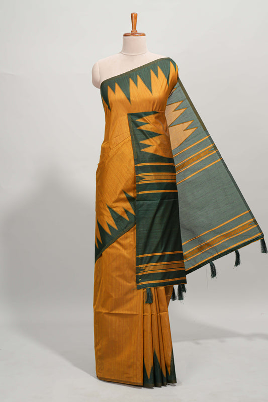 Mustard plain semi tussar saree with contrast geometric border and motifs blouse