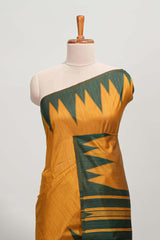 Mustard plain semi tussar saree with contrast geometric border and motifs blouse
