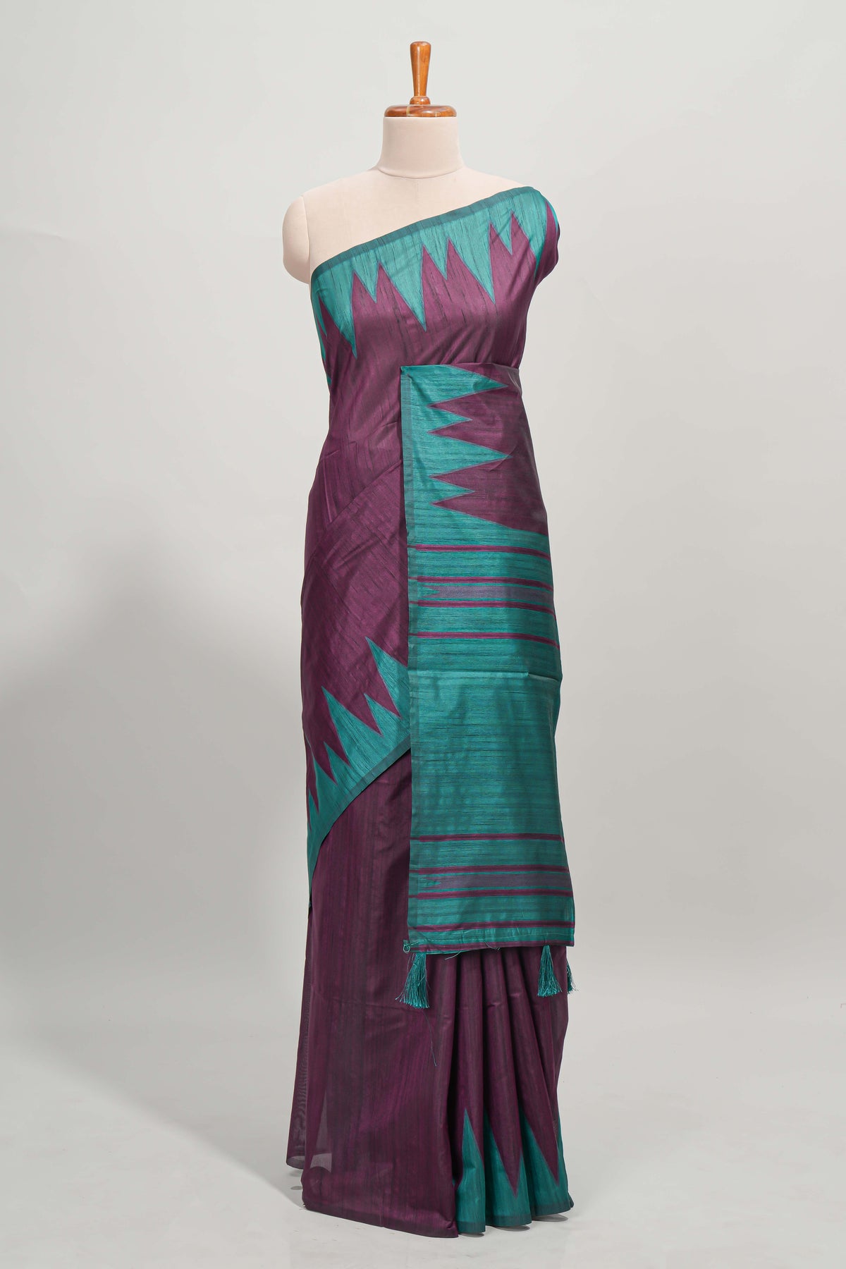 Purple plain semi tussar saree with contrast geometric border and motifs blouse