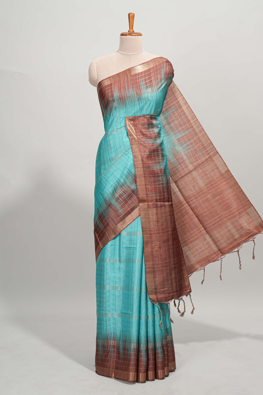 Turquoise green checked semi tussar saree with contrast border and striped blouse