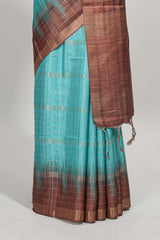 Turquoise green checked semi tussar saree with contrast border and striped blouse