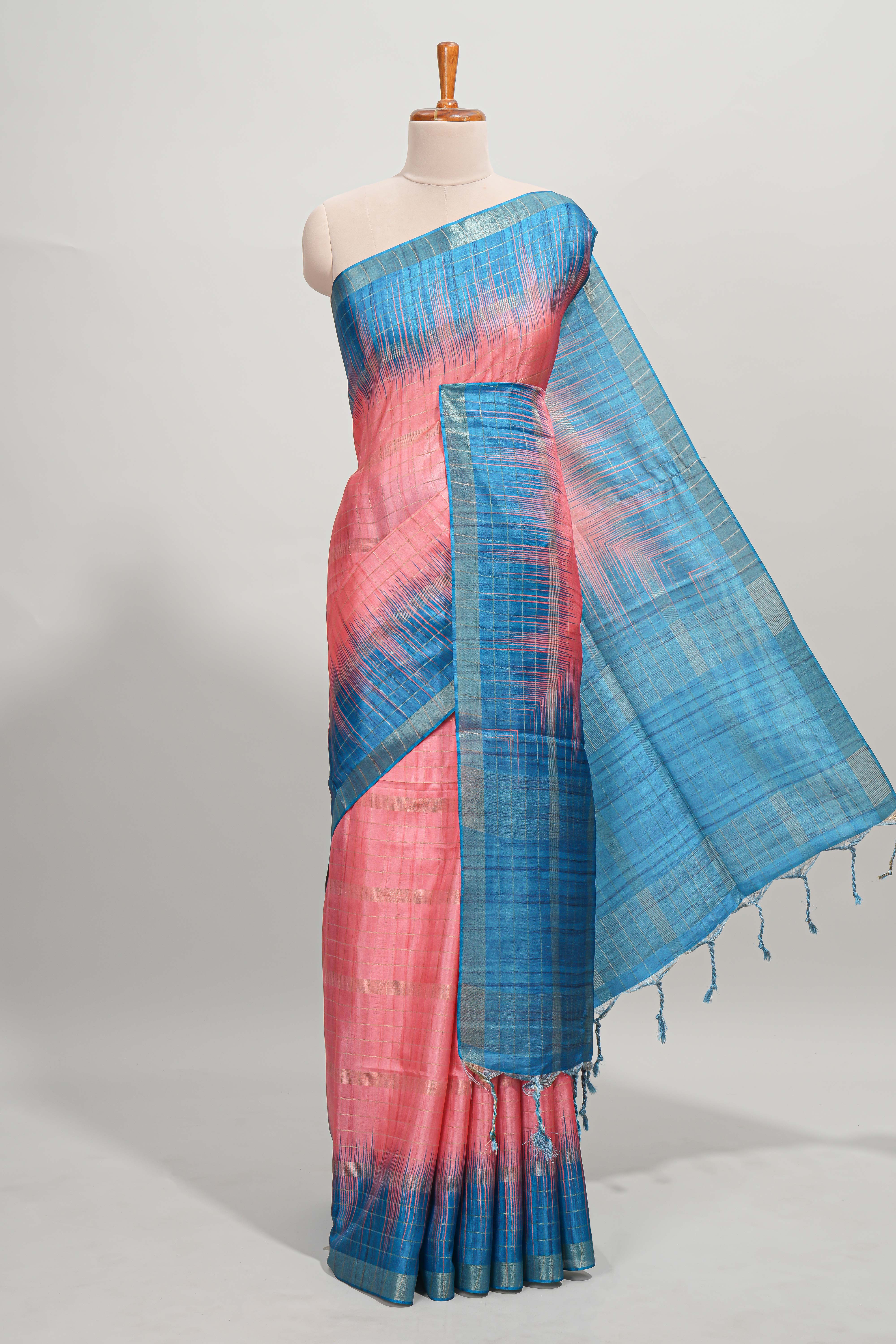 Pink checked semi tussar saree with contrast border and striped blouse