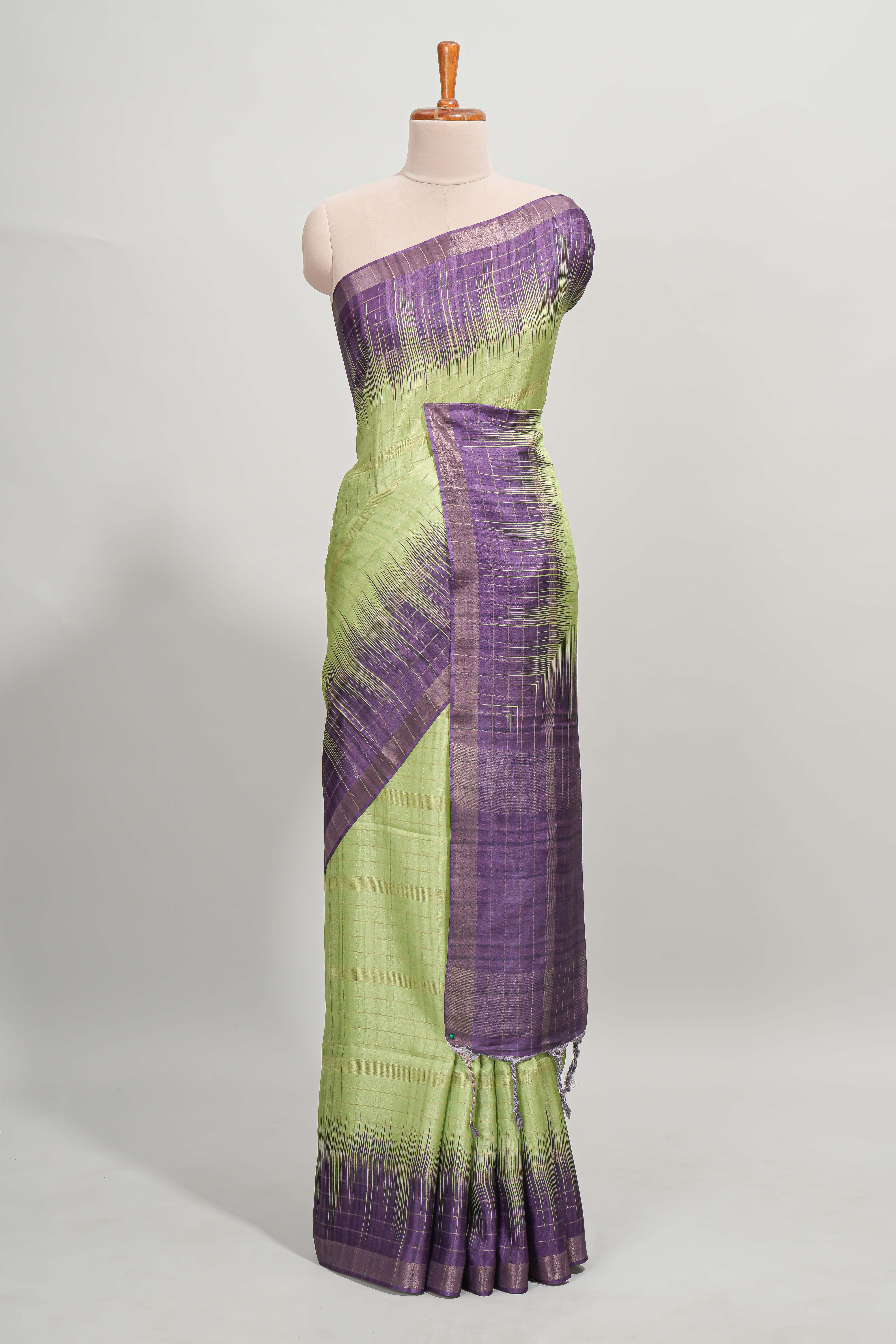 Green checked semi tussar saree with contrast border and striped blouse