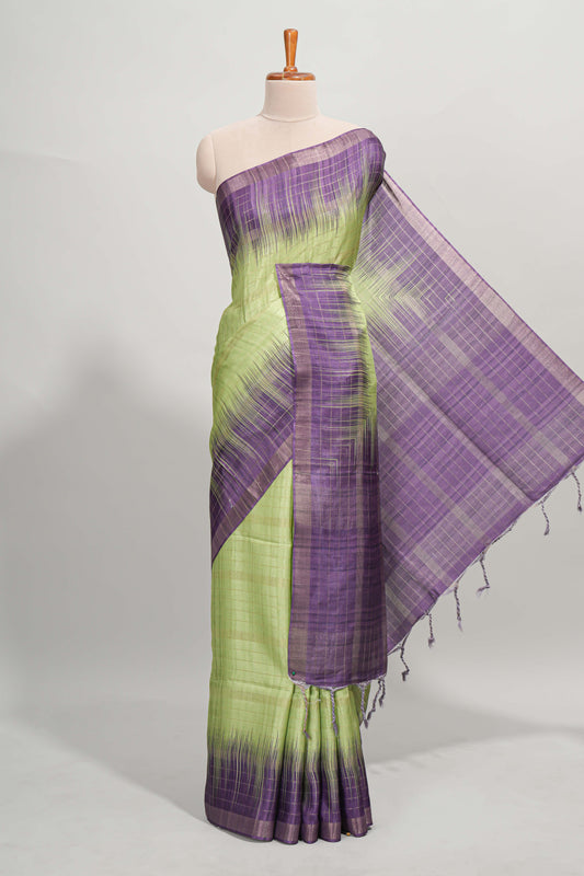 Green checked semi tussar saree with contrast border and striped blouse
