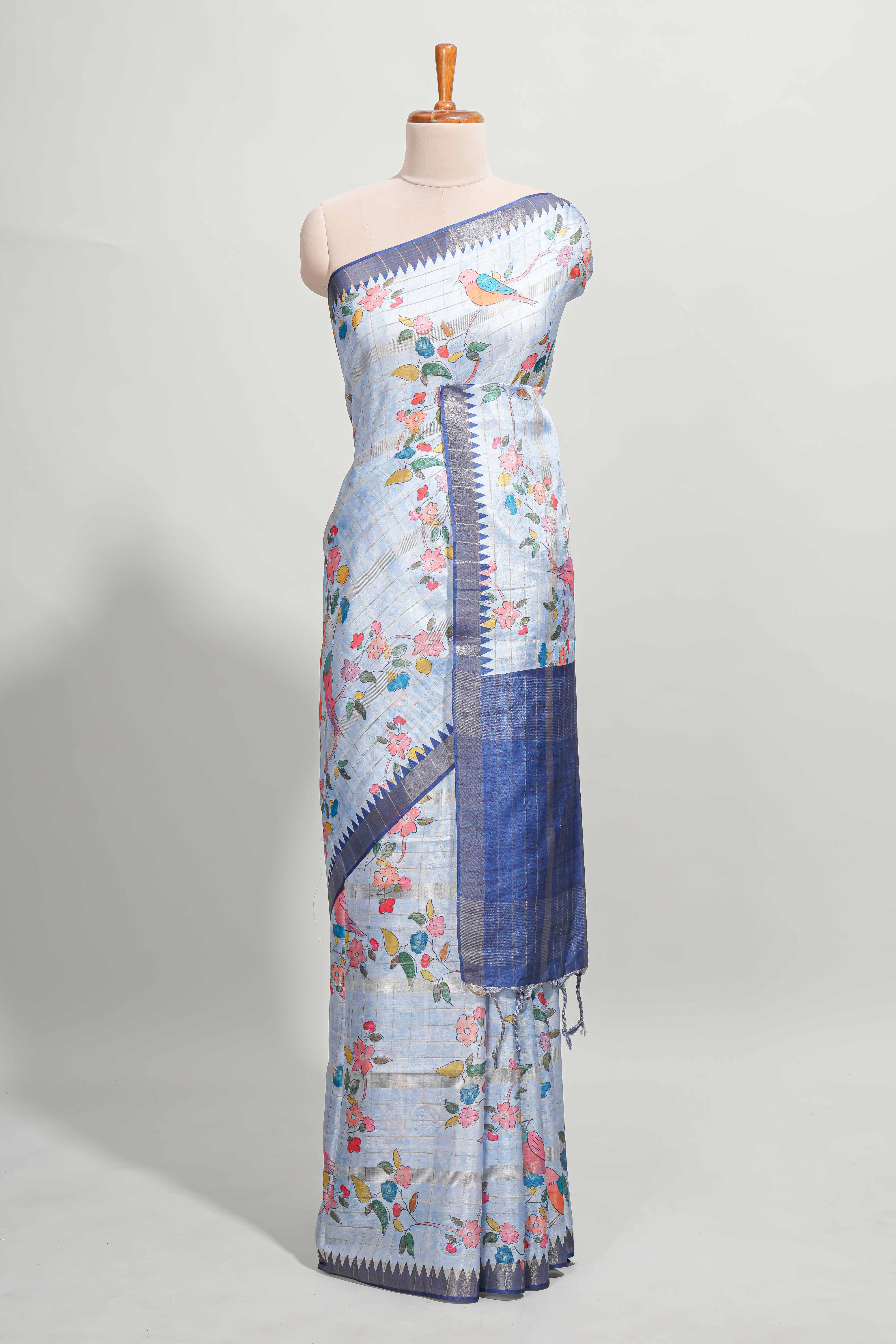 Blue checked birds & floral design semi tussar saree with contrast border and checked blouse