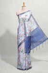 Blue checked birds & floral design semi tussar saree with contrast border and checked blouse