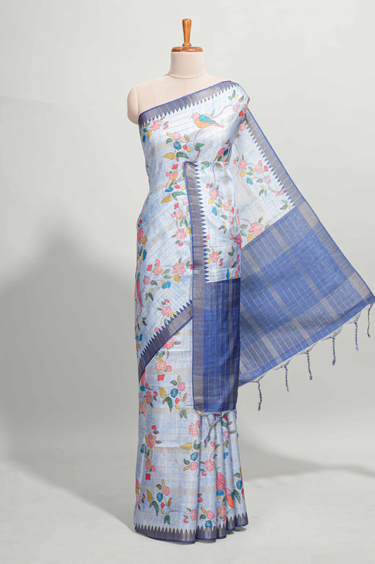 Blue checked birds & floral design semi tussar saree with contrast border and checked blouse