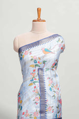 Blue checked birds & floral design semi tussar saree with contrast border and checked blouse