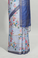 Blue checked birds & floral design semi tussar saree with contrast border and checked blouse