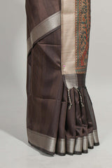 Brown plain semi tussar saree with self border and contrast printed blouse