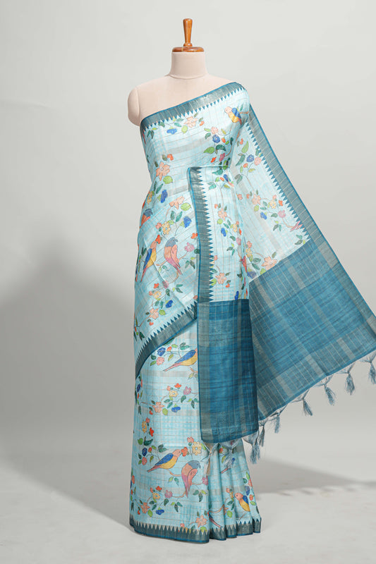 Powder blue checked birds & floral design semi tussar saree with contrast border and checked blouse