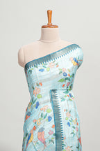 Powder blue checked birds & floral design semi tussar saree with contrast border and checked blouse