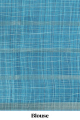 Powder blue checked birds & floral design semi tussar saree with contrast border and checked blouse