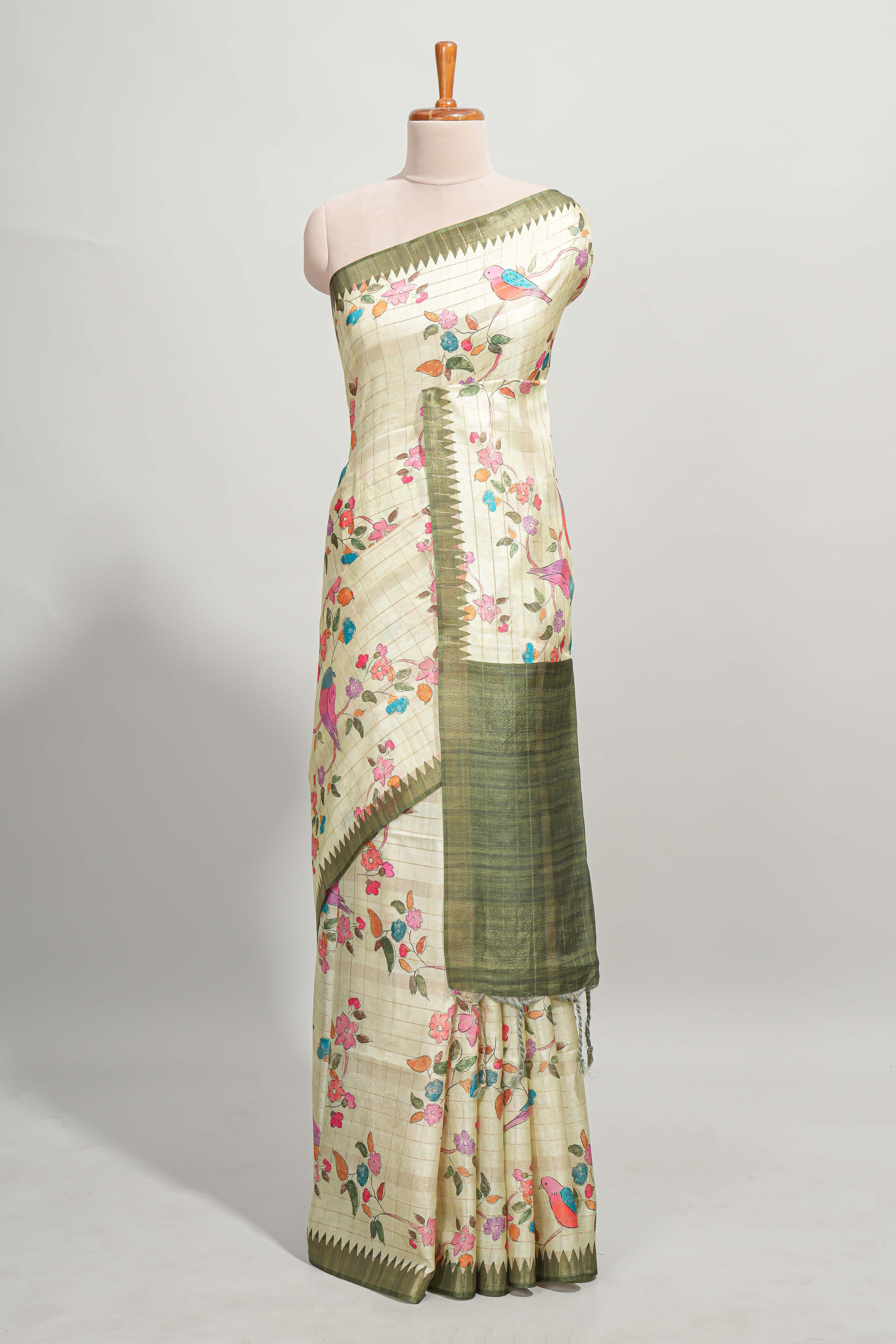 Green checked birds & floral design semi tussar saree with contrast border and checked blouse