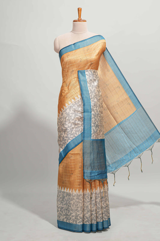 Orange striped floral design semi tussar saree with contrast border and striped blouse