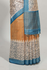 Orange striped floral design semi tussar saree with contrast border and striped blouse