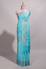 Blue jacquard floral zari motifs design semi tussar saree with self border and matching blouse