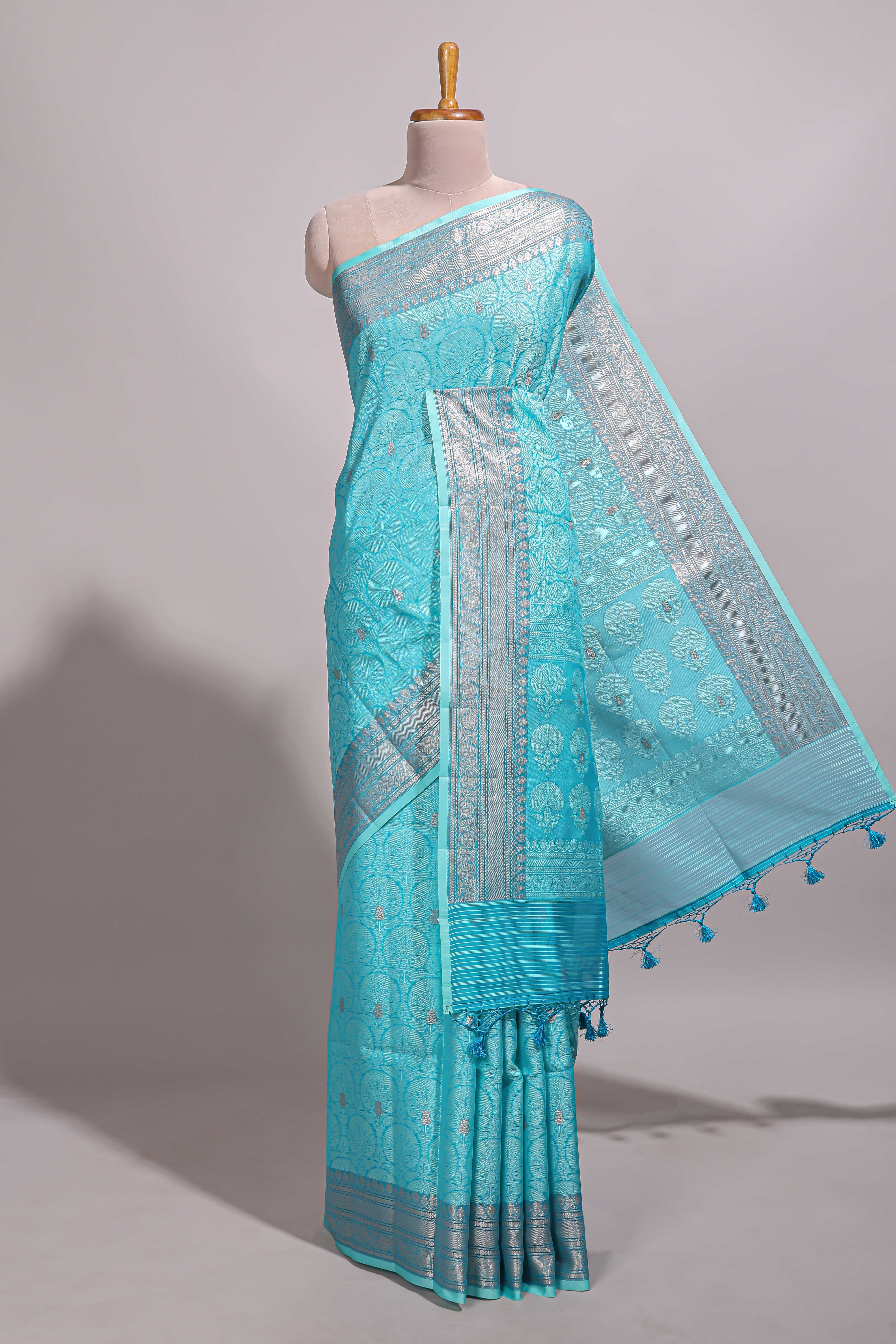 Blue jacquard floral zari motifs design semi tussar saree with self border and matching blouse