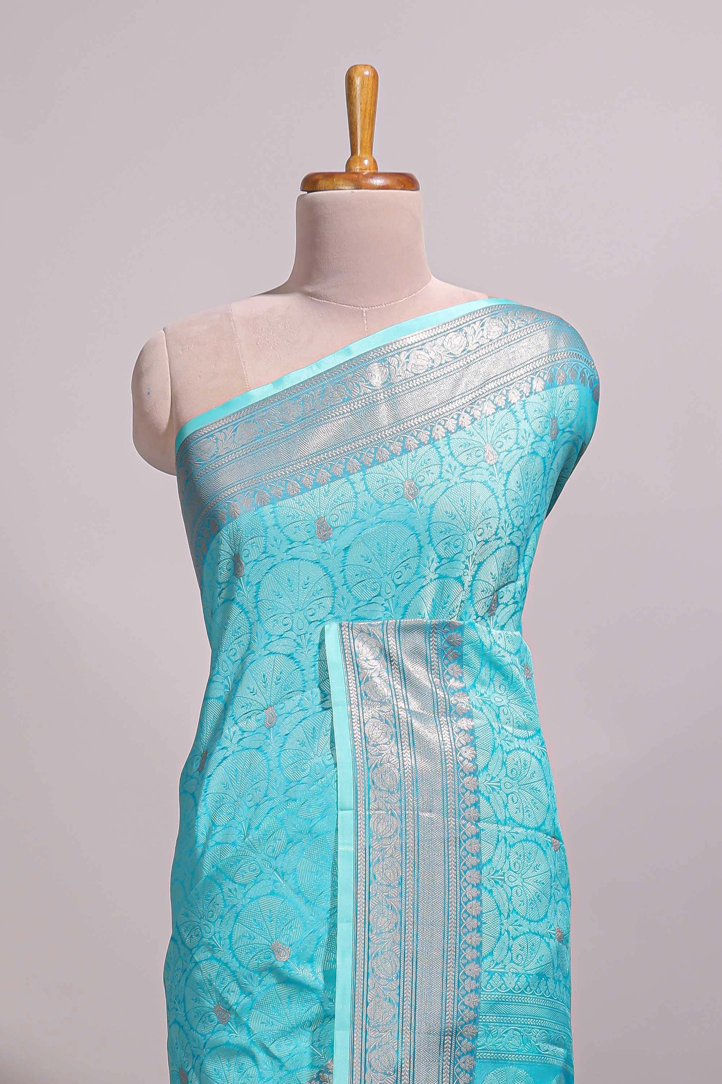 Blue jacquard floral zari motifs design semi tussar saree with self border and matching blouse