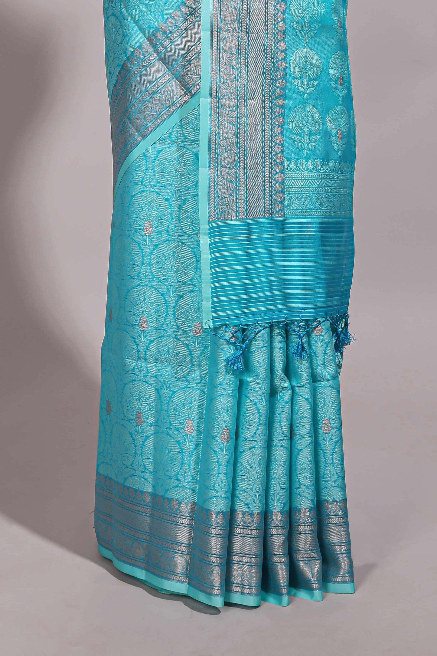Blue jacquard floral zari motifs design semi tussar saree with self border and matching blouse
