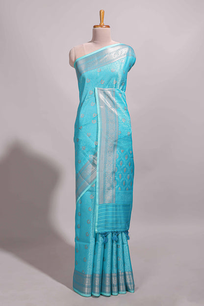 Blue jacquard floral zari motifs design semi tussar saree with self border and matching blouse