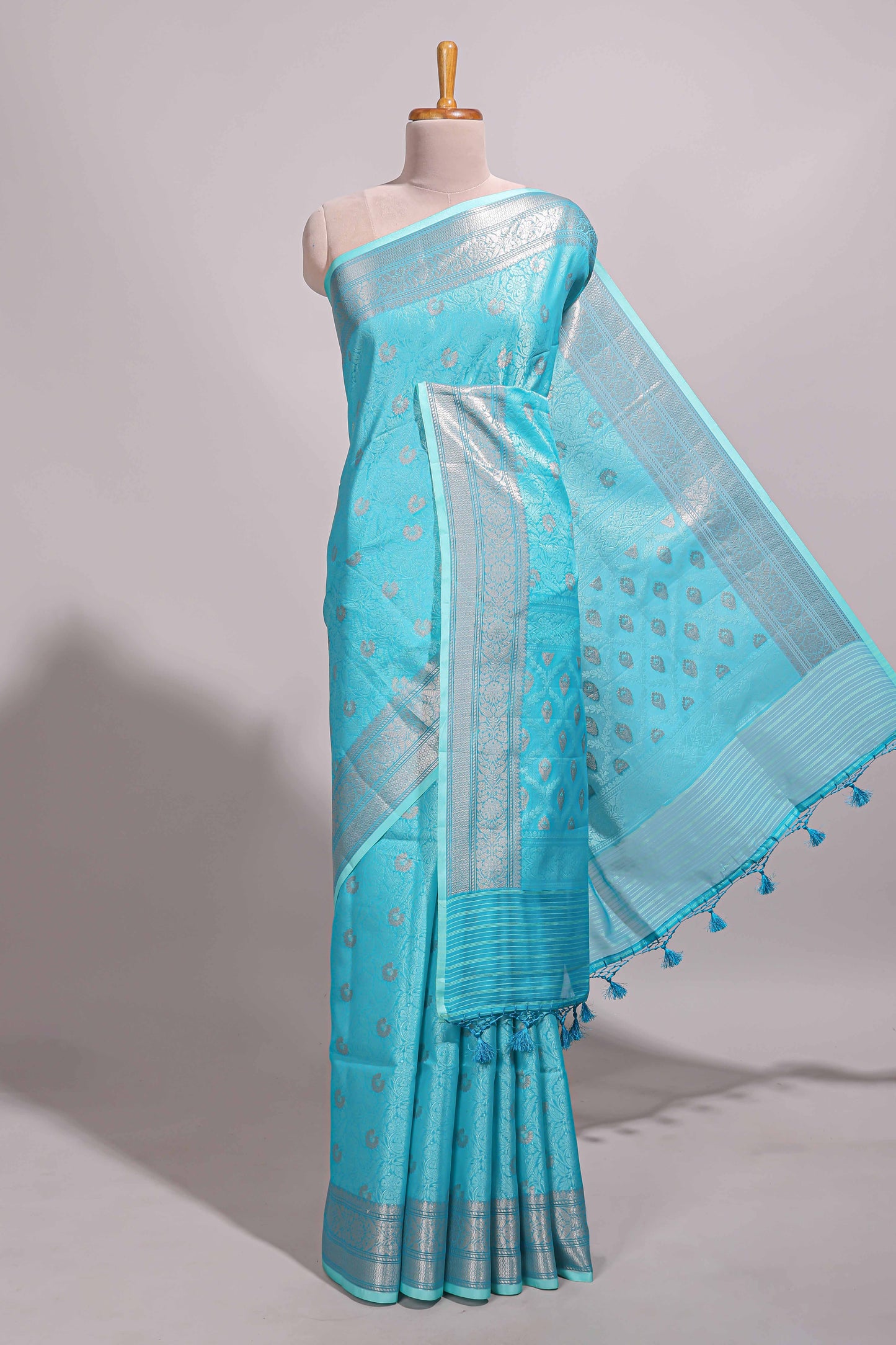 Blue jacquard floral zari motifs design semi tussar saree with self border and matching blouse