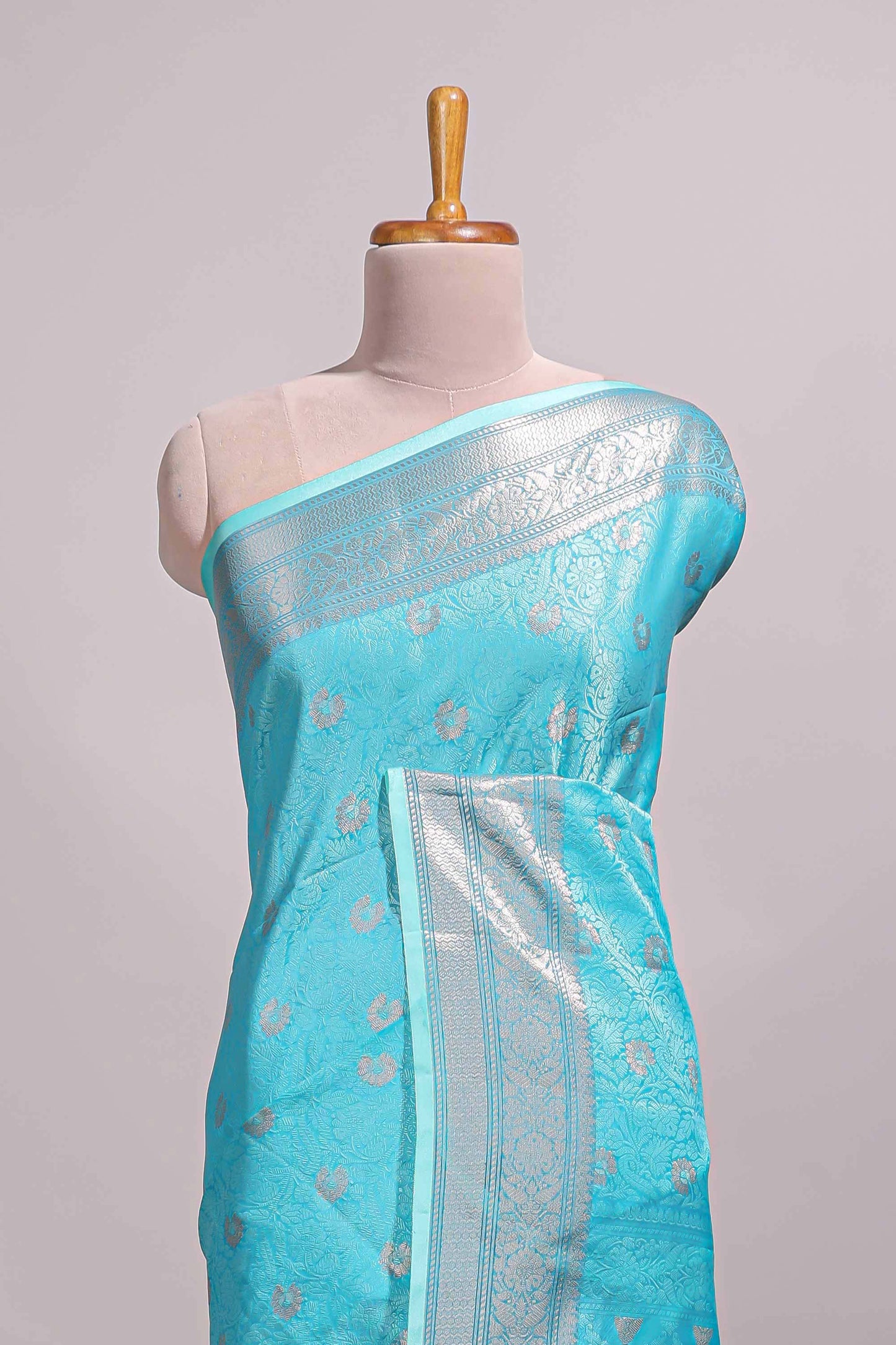 Blue jacquard floral zari motifs design semi tussar saree with self border and matching blouse