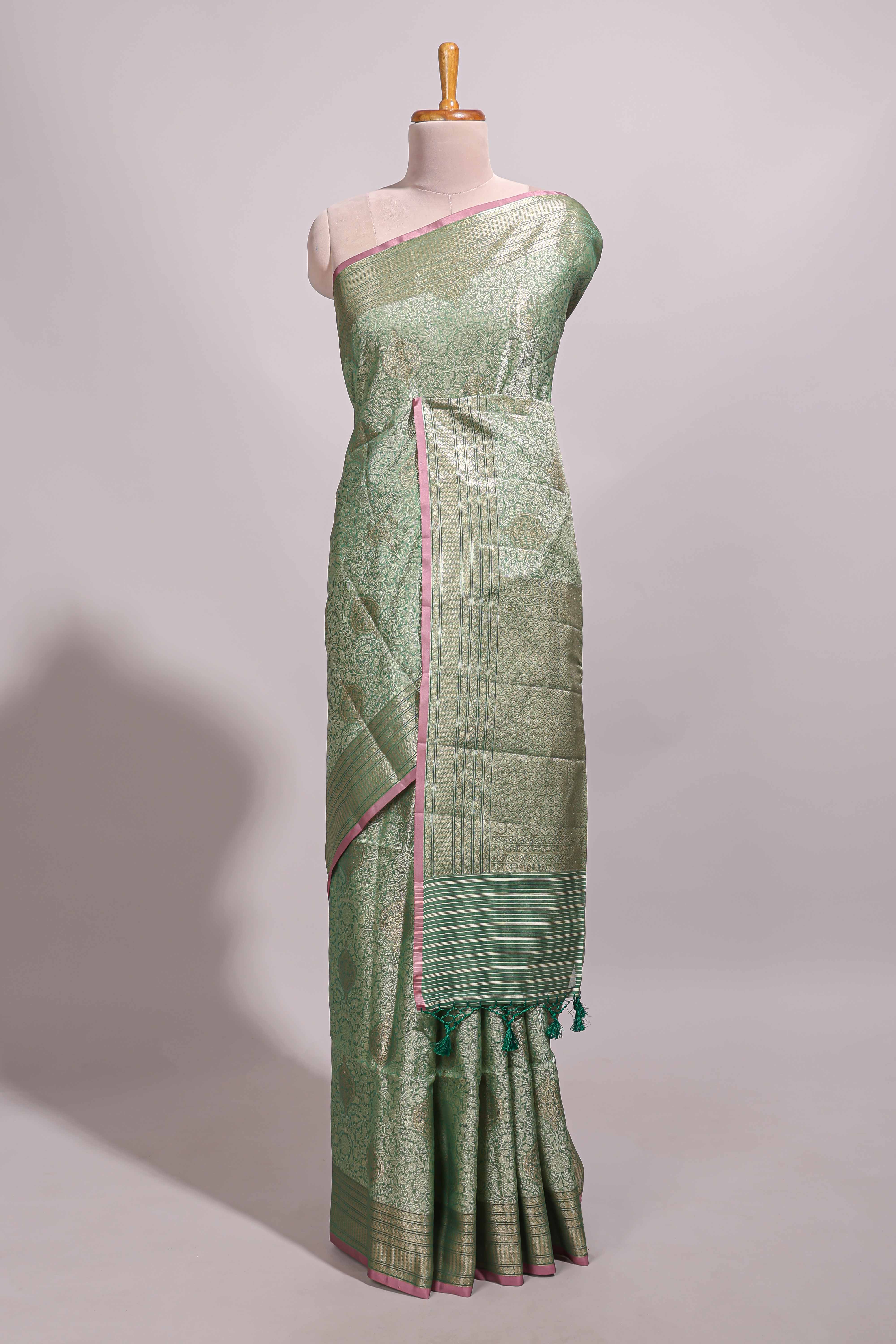 Green jacquard floral zari motifs design semi tussar saree with self border and matching blouse