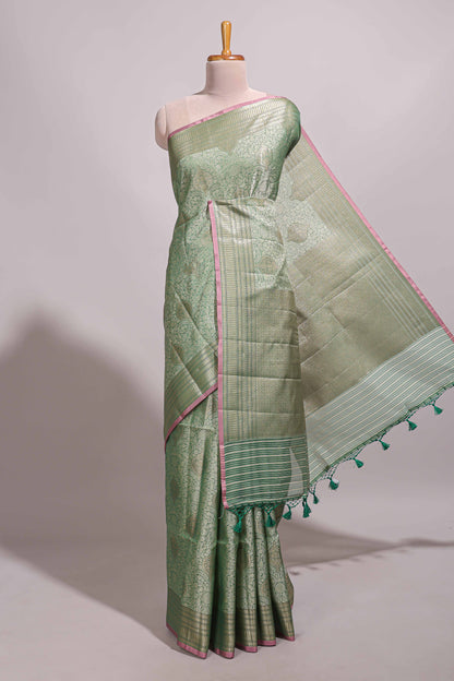 Green jacquard floral zari motifs design semi tussar saree with self border and matching blouse