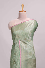 Green jacquard floral zari motifs design semi tussar saree with self border and matching blouse