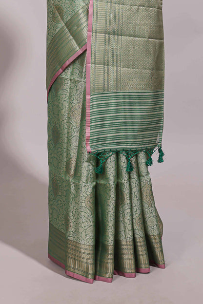 Green jacquard floral zari motifs design semi tussar saree with self border and matching blouse