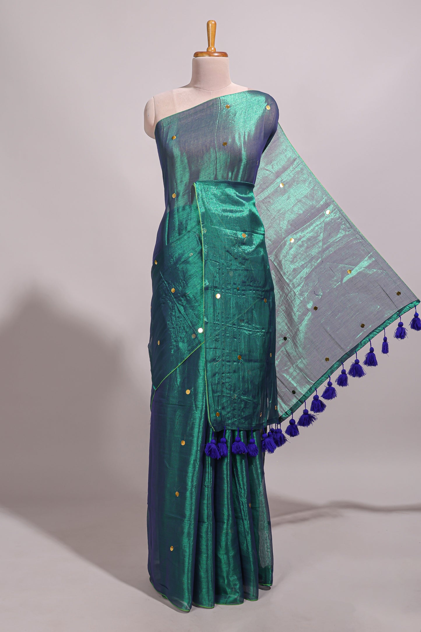 Borderless green sequins embroidery design semi tussar saree with matching blouse and contrast tassels