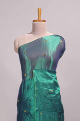 Borderless green sequins embroidery design semi tussar saree with matching blouse and contrast tassels