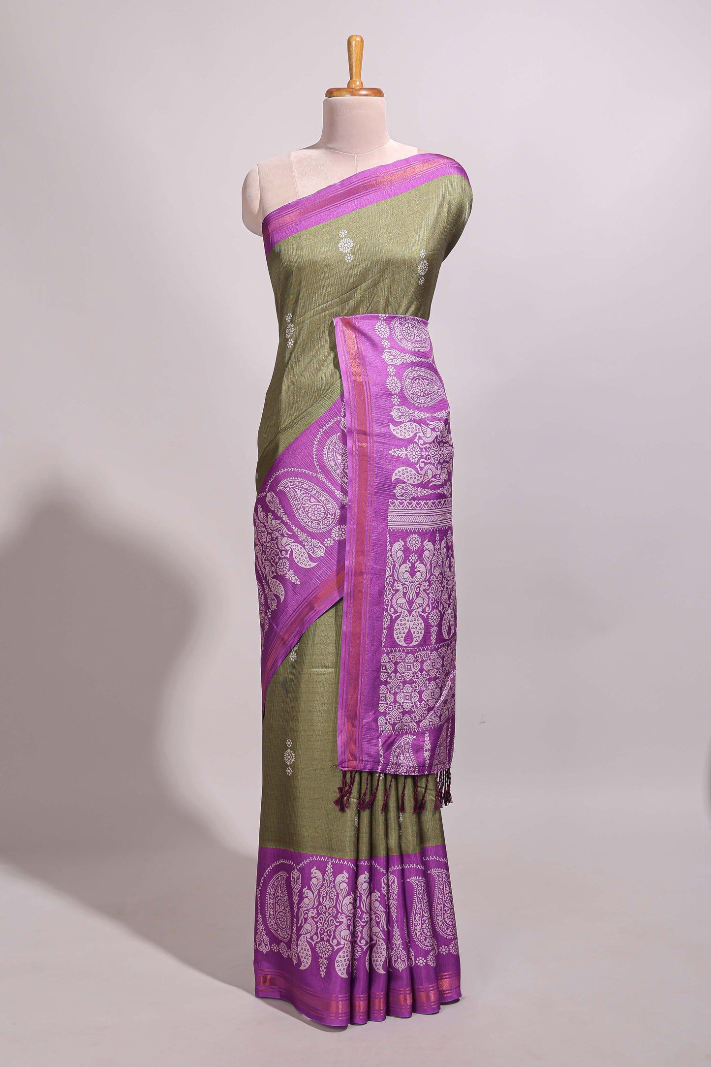 Green floral motifs semi tussar saree with contrast border and printed blouse