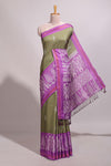 Green floral motifs semi tussar saree with contrast border and printed blouse