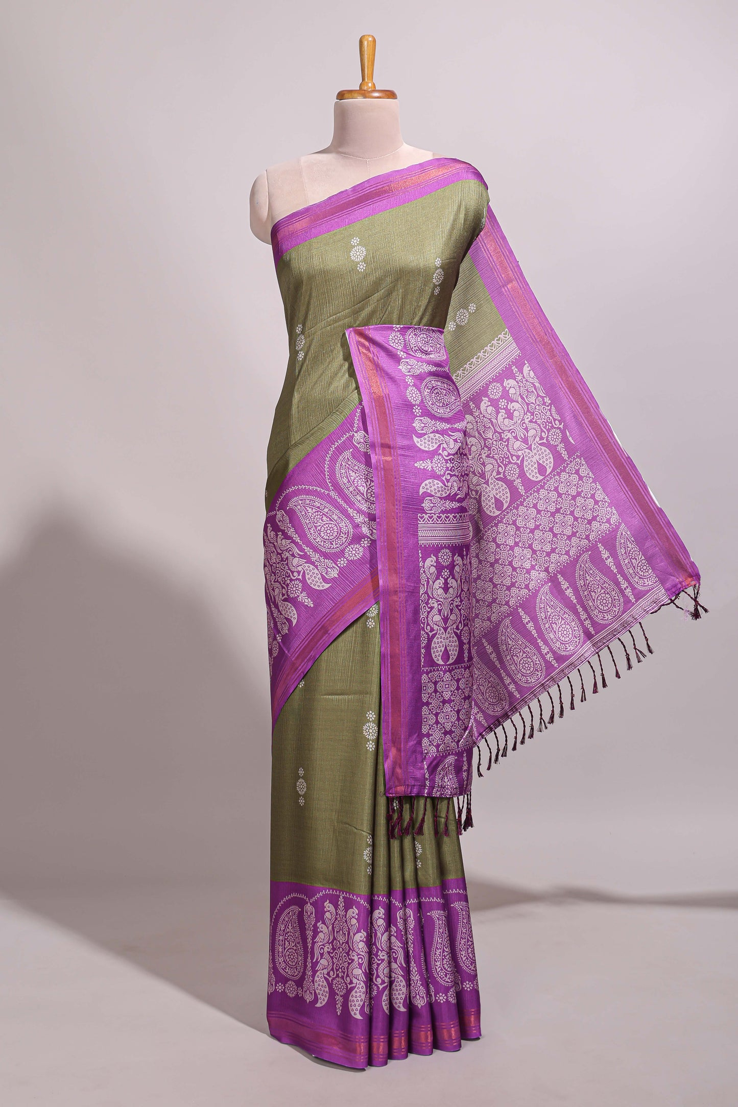 Green floral motifs semi tussar saree with contrast border and printed blouse