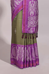 Green floral motifs semi tussar saree with contrast border and printed blouse
