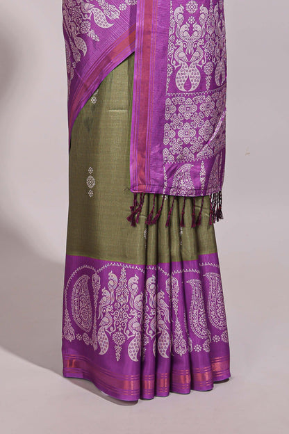 Green floral motifs semi tussar saree with contrast border and printed blouse