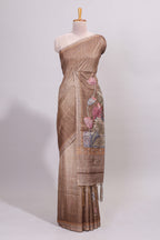 Brown floral design semi tussar saree with self border and matching printed blouse