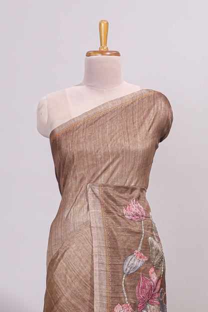 Brown floral design semi tussar saree with self border and matching printed blouse